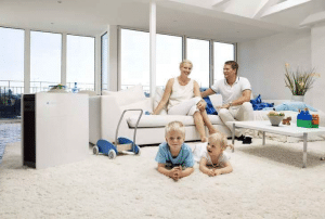 picture of family in their home with clear air to breath.