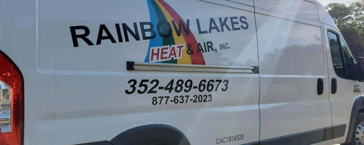 Rainbow Lakes Heating and Air Conditioning truck sitting in the summer sun.